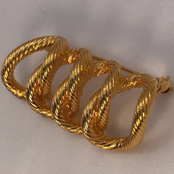 MONET Gold-tone Four Textured Rings Brooch - Picture 1 of 5